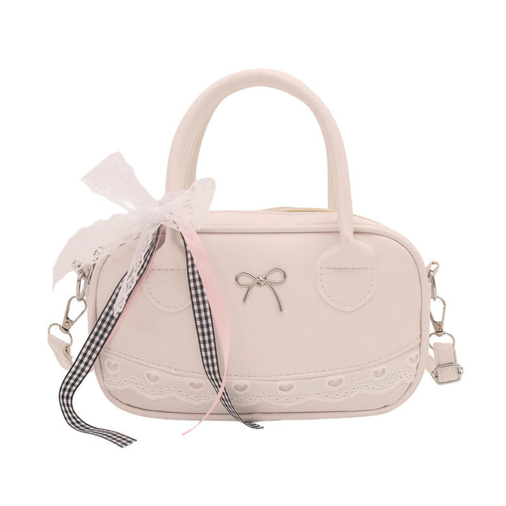 Elegante mit Spitzenbesatz verzierte Bogenhandtasche Karnz