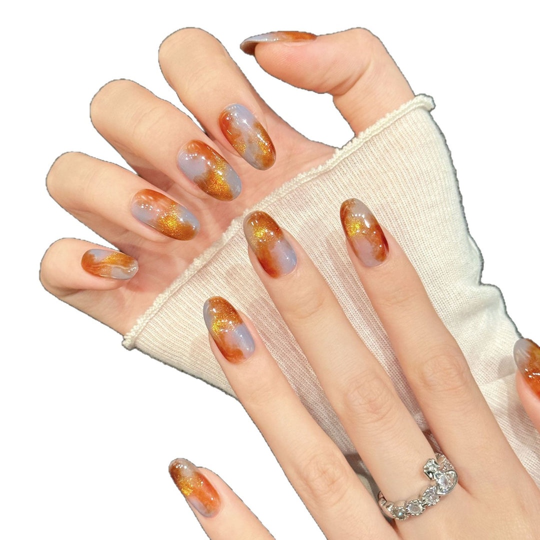 Künstlerisches Ombre Press-On Nagelset mit Glitzerakzenten