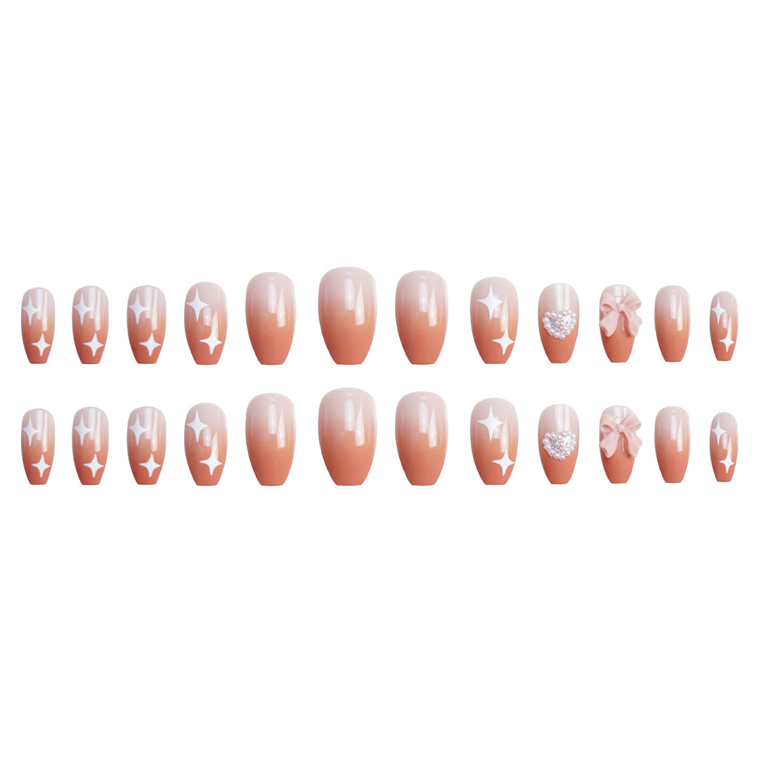 Dekorativer Press-On-Nagelset mit Strass- und Schleifenakzenten