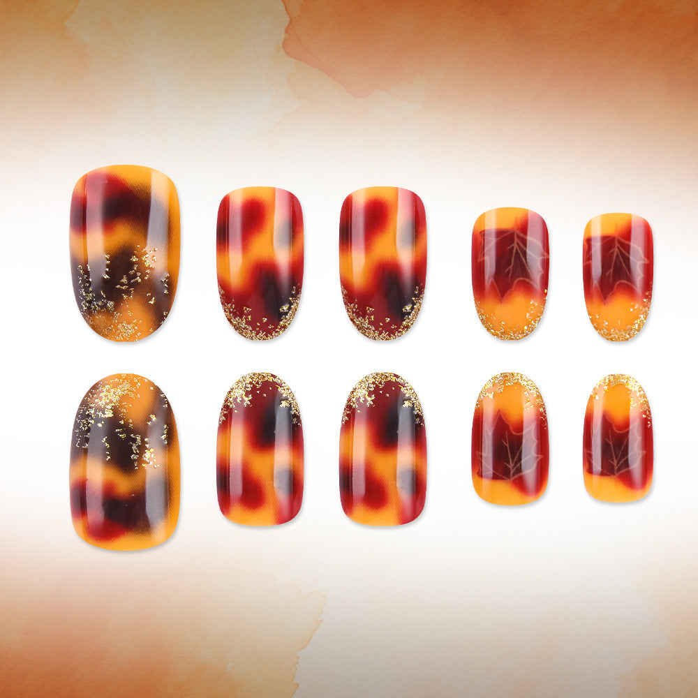 Künstlerisches Press-On-Nagelset mit Herbstblatt-Design Karnz
