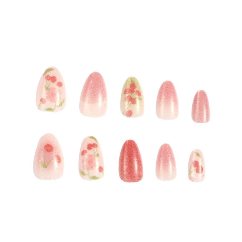 Kreatives Kunstnagelset mit Kirsch-Design Karnz