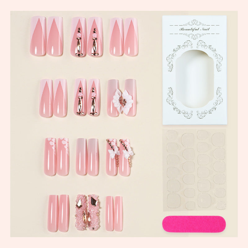 Dekorativer künstlicher Nagelset mit floralen und Juwel-Akzenten Karnz