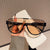 Damen futuristische Oversized-Sonnenbrille mit klarem Full-Rim-Rahmen Karnz