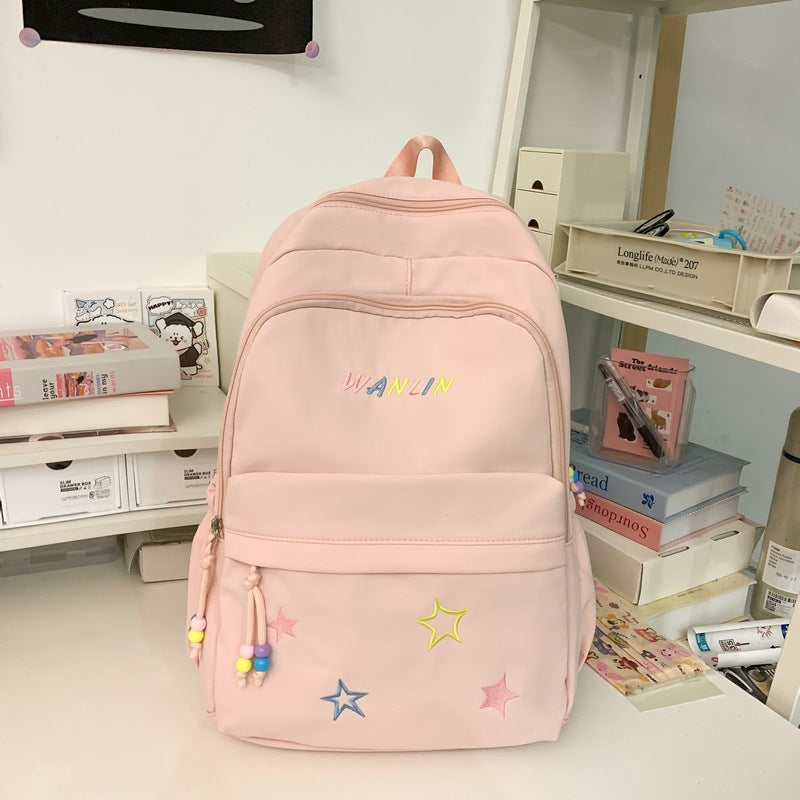 Verspielter mit Sternen verzierter Rucksack Karnz