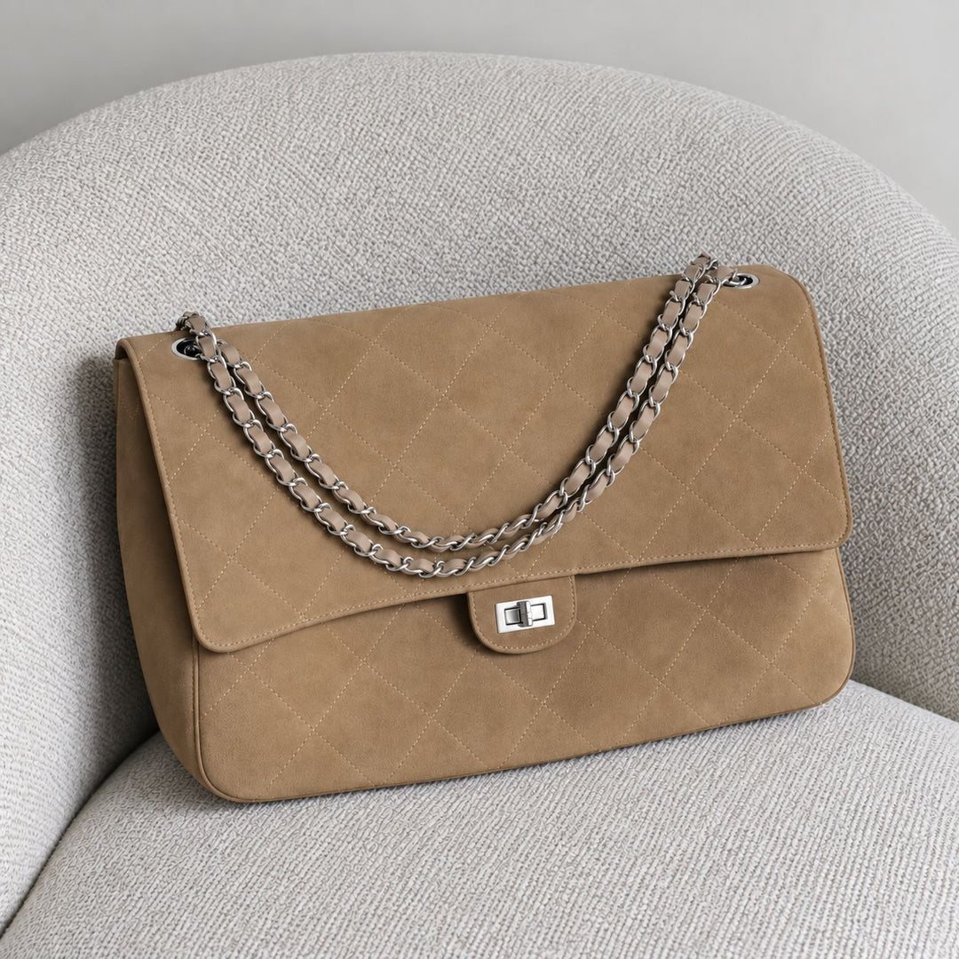 Elegante gesteppte Schulter