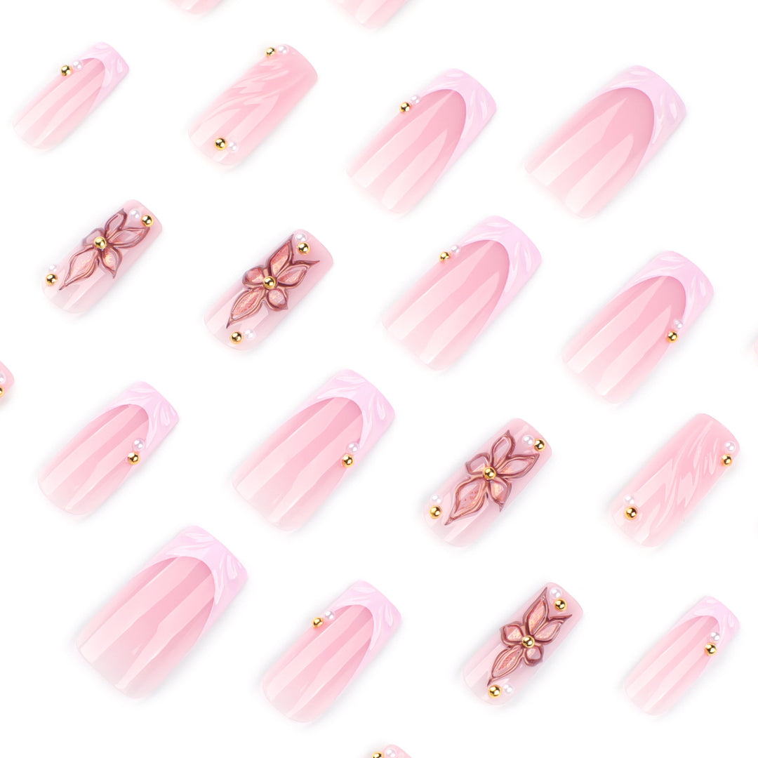 Kunstvolle Acryl-Nägel mit Blumendesign und Glitzervariationen Karnz