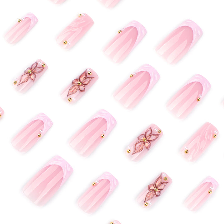 Kunstvolle Acryl-Nägel mit Blumendesign und Glitzervariationen Karnz