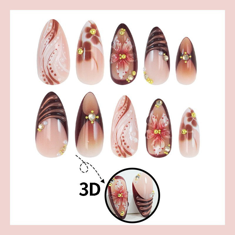 Kunstnagelset mit eleganten 3D-Blütenakzenten und glamourösen Designs Karnz