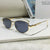 Damen elegante Sonnenbrille mit funkelndem Metallrahmen Karnz