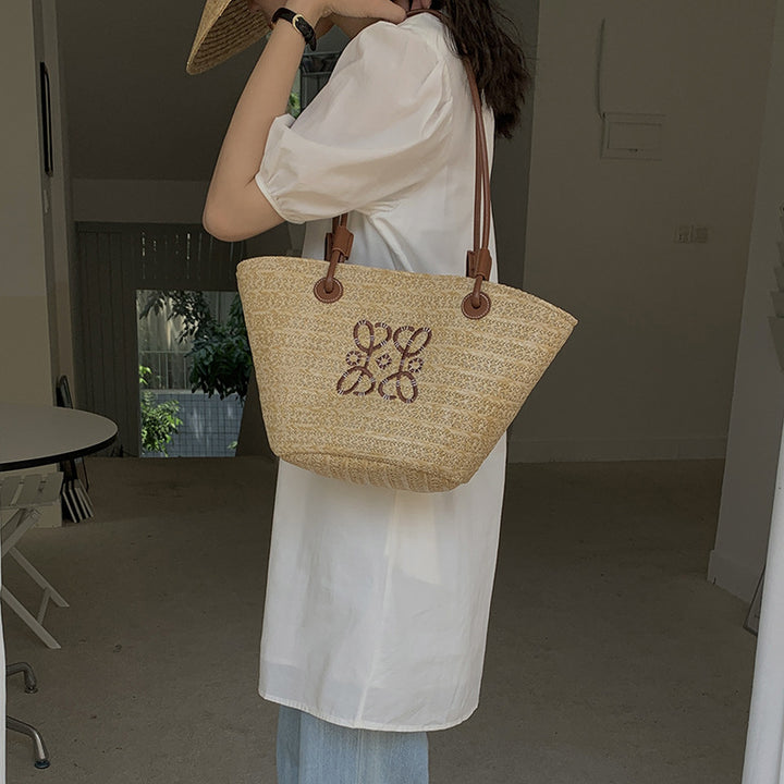 Damen Elegante Handtasche aus geflochtenem Naturmaterial mit luxuriösen Ledergriffen Karnz