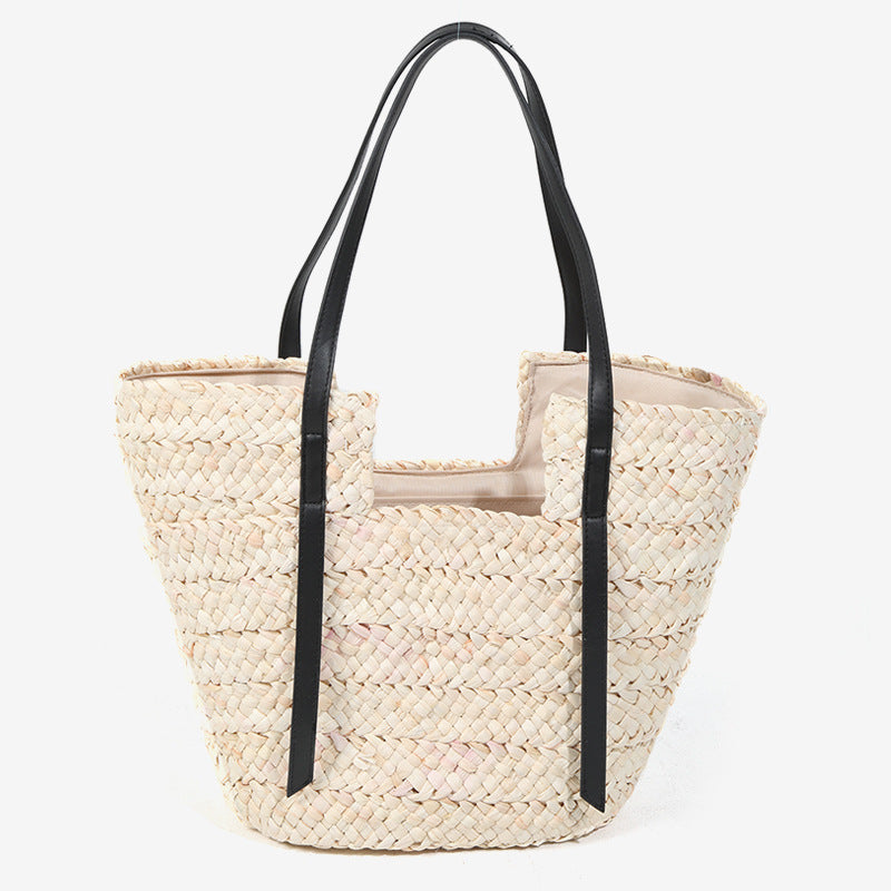Damen Handtasche aus geflochtenem Naturmaterial mit eleganten Ledergriffen Karnz