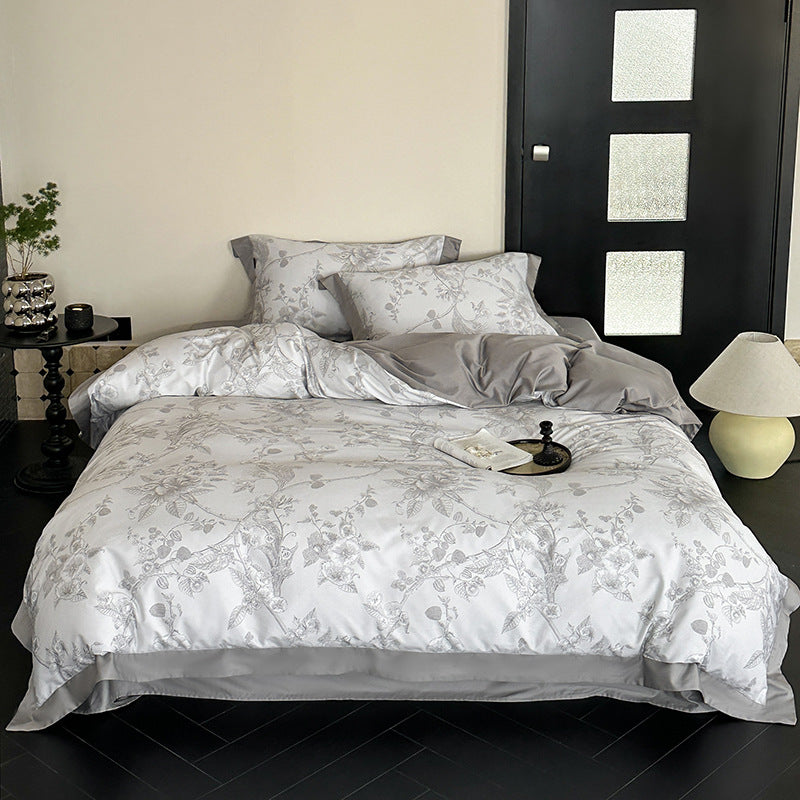 Exklusive Baumwollsatin-Bettwäschegarnitur mit floraler Jacquardstruktur und Wendefunktion