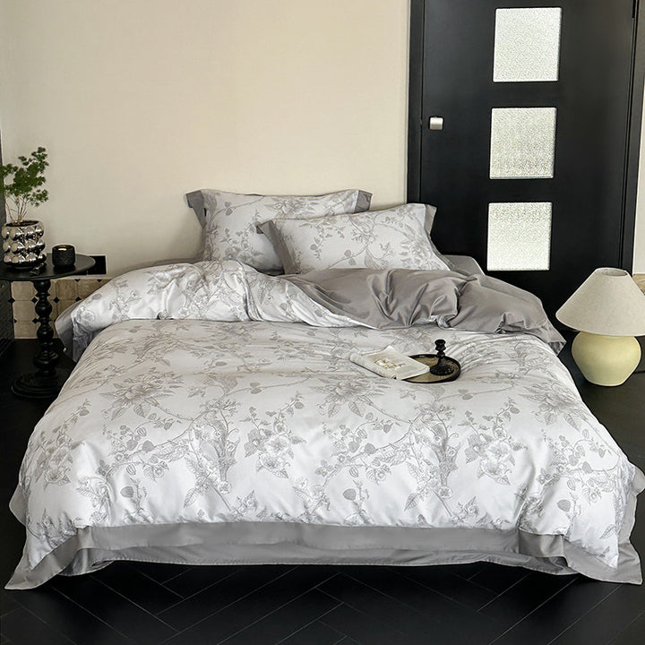 Exklusive Baumwollsatin-Bettwäschegarnitur mit floraler Jacquardstruktur und Wendefunktion