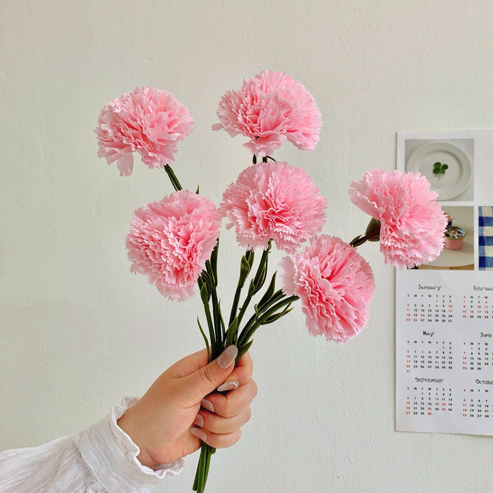 Dekoratives Blumenmittelstück für Tischdekoration