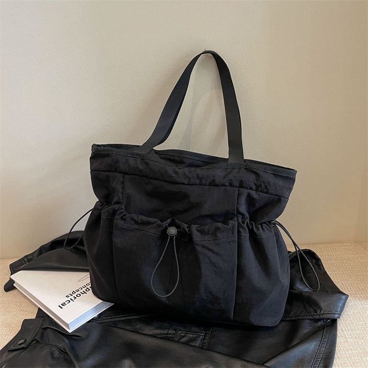 Erweiterbare Utility-Tasche Karnz