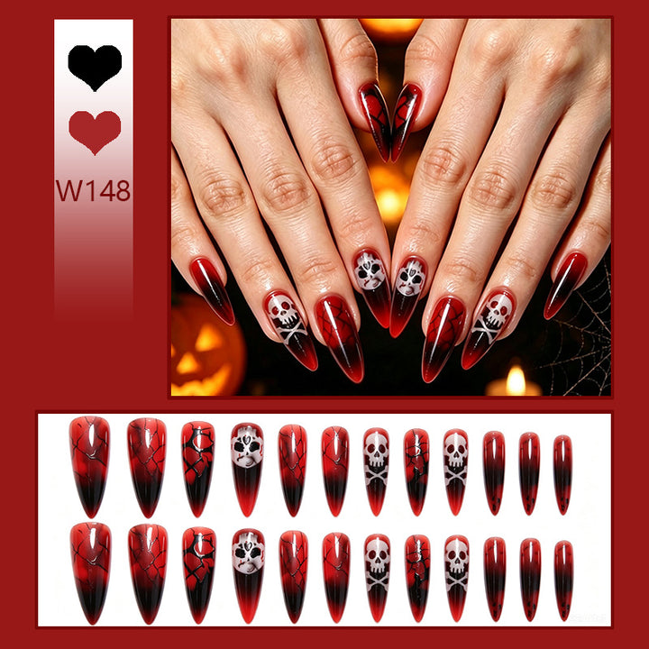 Kunstnagelset mit Halloween-Motiven und eleganten Akzenten Karnz