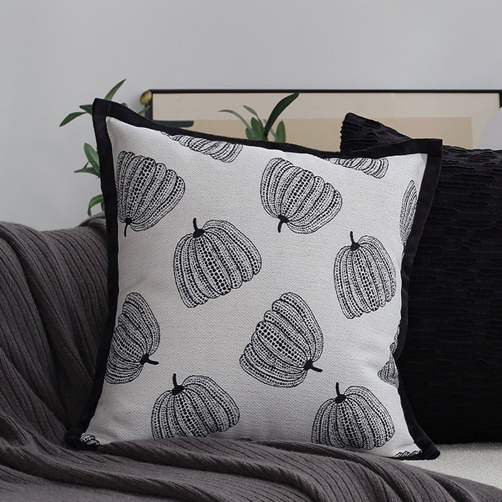 Dekoratives Wohnkissen mit feinem Jacquard-Baumdruck und Samtpaspel Karnz