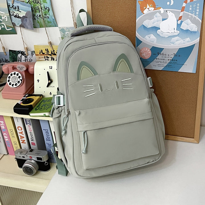 Verspielt katzenmotivierter Rucksack