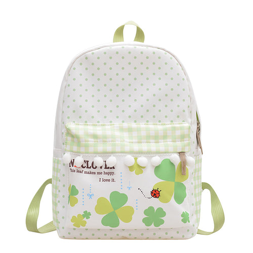 Verspielt gemusterter Schulrucksack