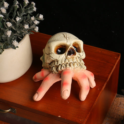 Detaillierte Halloween-Dekoskulptur Schädel mit greifender Hand