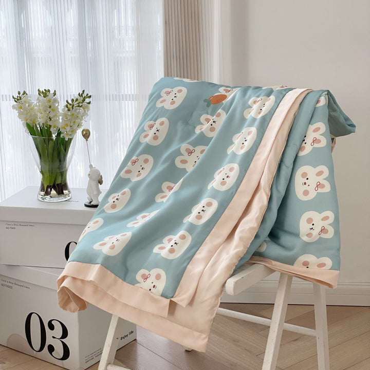 Kinder-Bettwäscheset aus Baumwollsatin mit verspieltem Safari-Tierprint und kontrastierter Saumkante