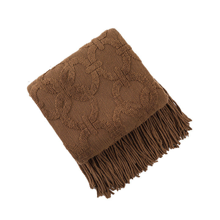 Gemütliche strukturierte Fransenwurfdecke