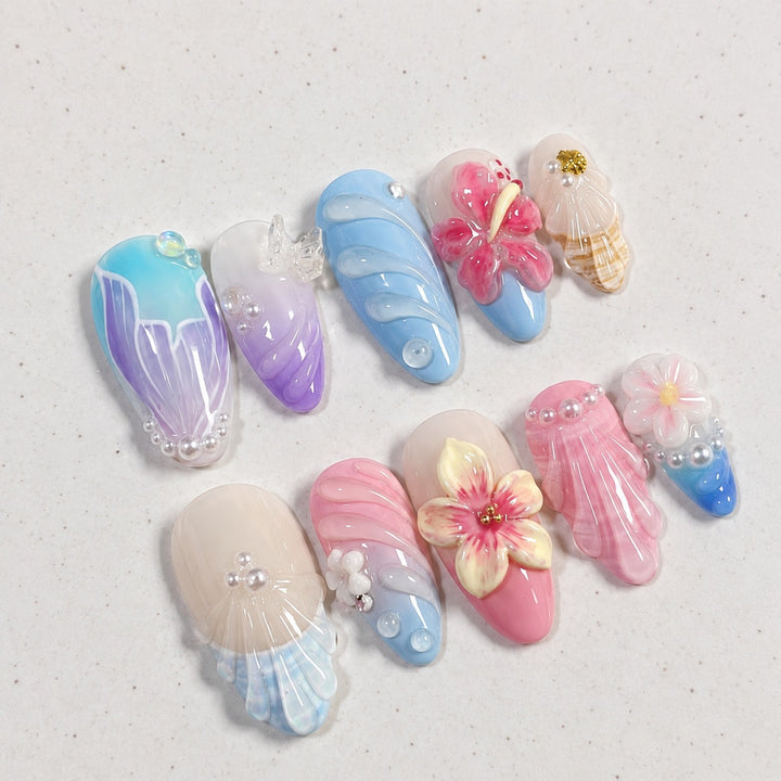 Kunstnagelset mit eleganten floralen Akzenten und kreativen Designs Karnz