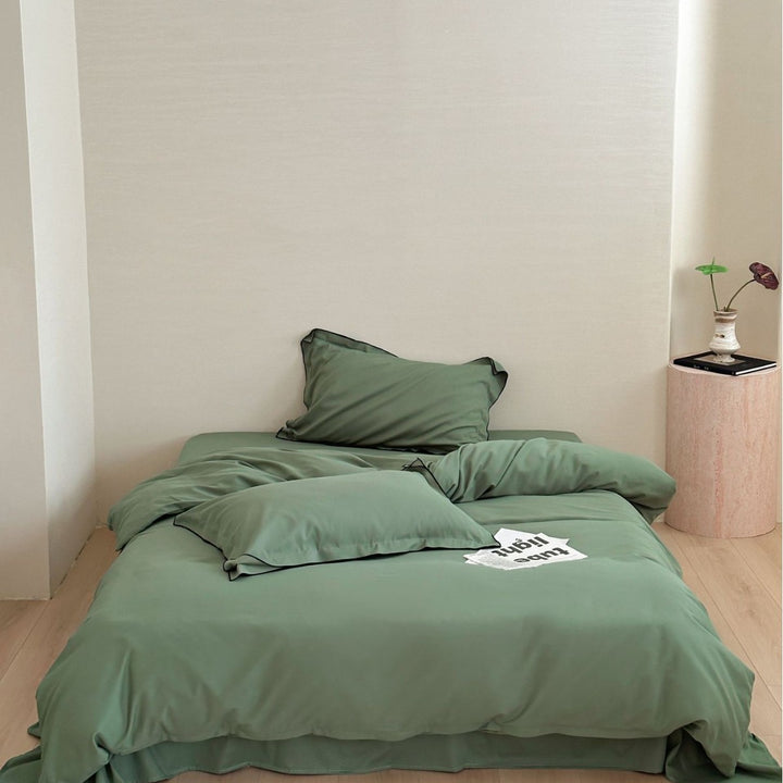 Luxuriöses Bettwäsche-Set aus Baumwollsatin mit kontrastierter Paspelierung