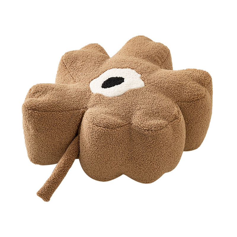 Blumenförmiger Bodensitzpouf mit Bouclé‑Bezug und segmentierter Polsterung