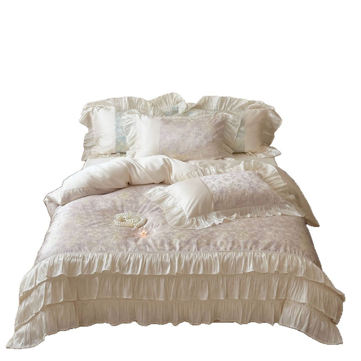 Romantisches Bettwäscheset aus Baumwollsatin mit Rüschenvolant und zartem Blumenprint