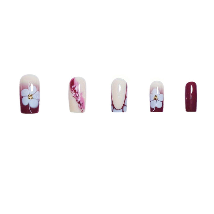 Künstlerische Gel-Nagelverlängerungen mit floralem Design Karnz