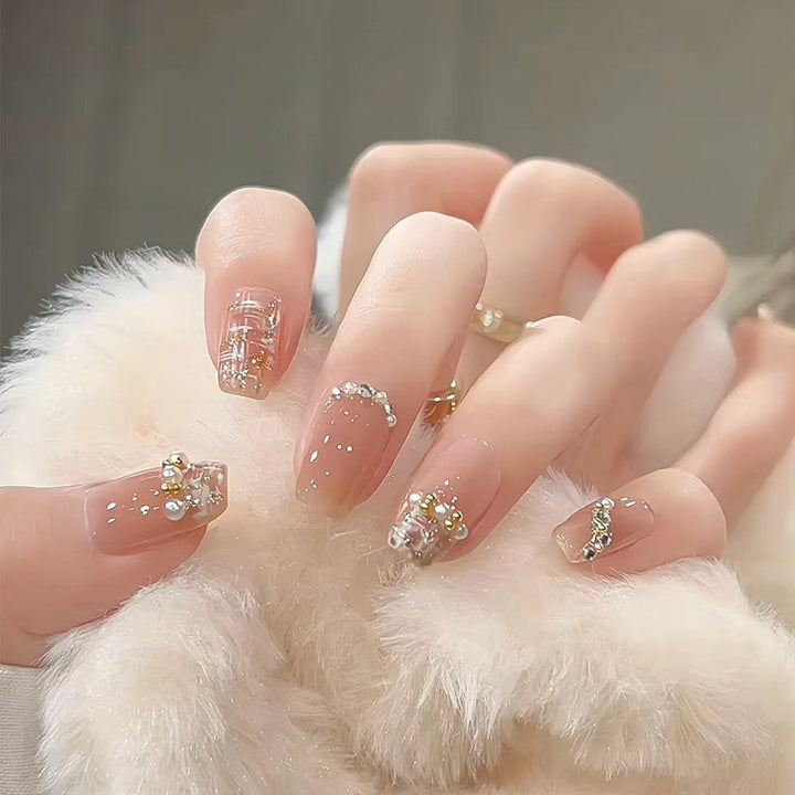 Künstlerisches Press-On-Nagelset mit glitzernden Sternakzenten Karnz