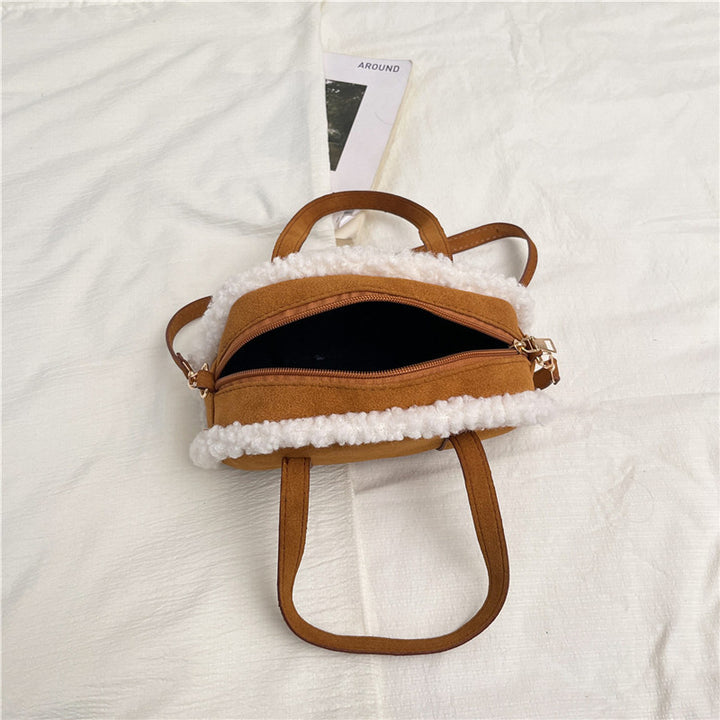 Gemütliche Kunstwildlederhandtasche