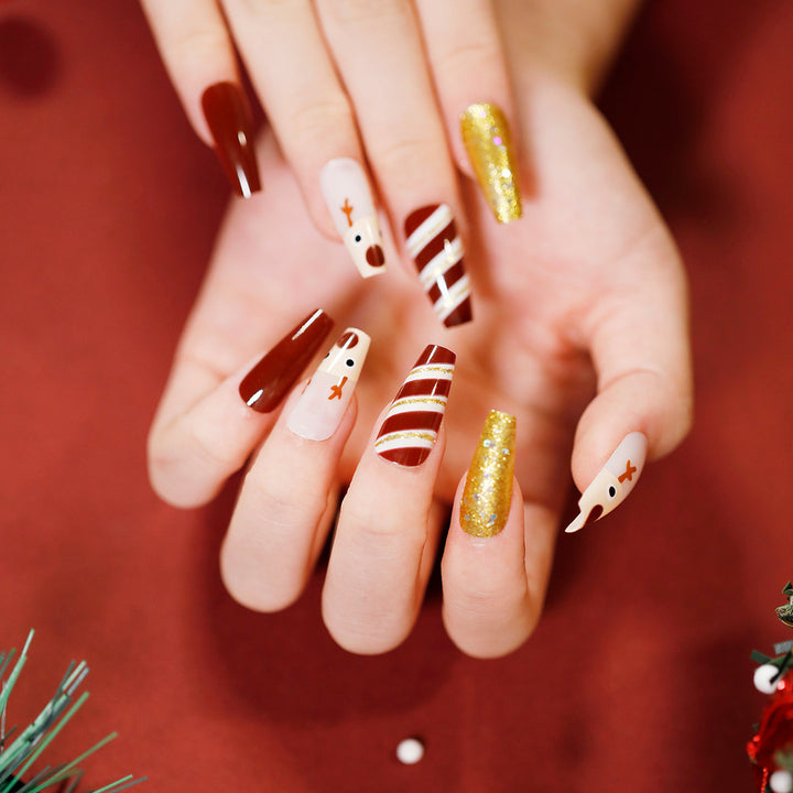 Elegante Acryl-Nägel mit goldenen Akzenten Karnz
