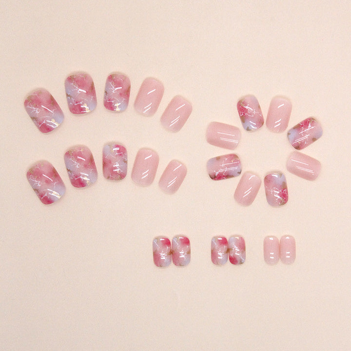 Marmoriertes Gel Press-On Nagelart Karnz