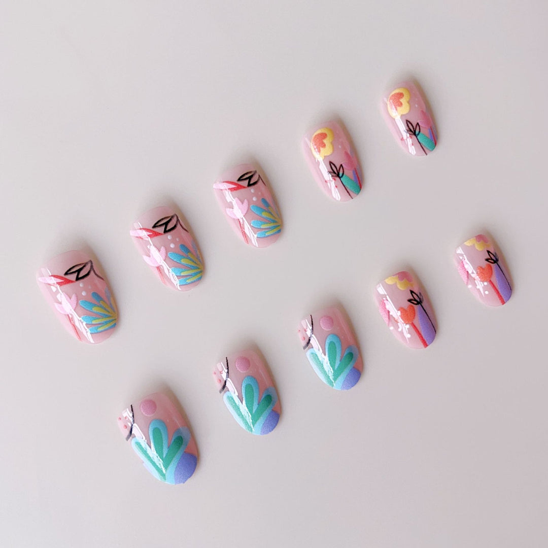 Kreatives Nagelkunstset mit bunten Blumen-Designs Karnz