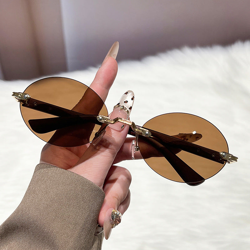 Damen modische und elegante Sonnenbrille mit ovalem Design Karnz