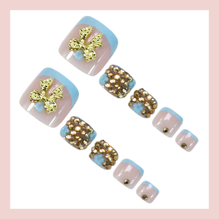 Kunstnagelset mit glamourösen Blumen- und Glitzerverzierungen Karnz