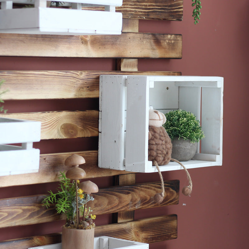 Wandregalsystem mit integrierten Aufbewahrungsboxen Karnz