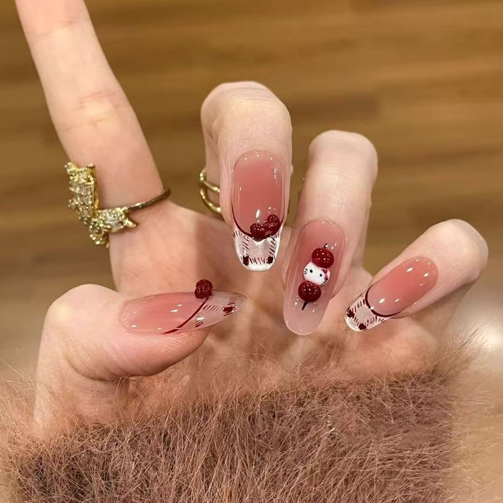 Niedliche themenbezogene Press-On Nagelkunst