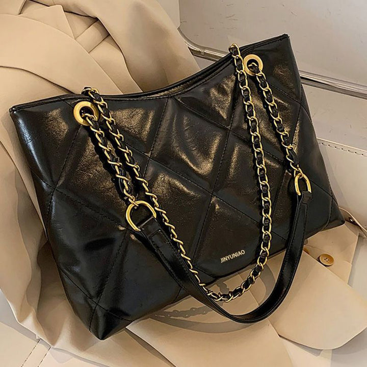 Gepolsterte schicke Handtasche Karnz