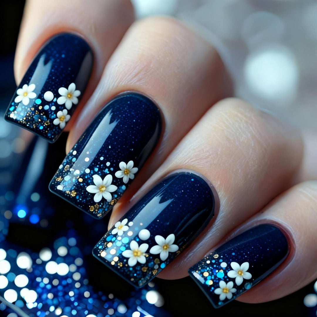 Kunstnagelset mit elegantem Blumendesign und Glitzerakzenten Karnz