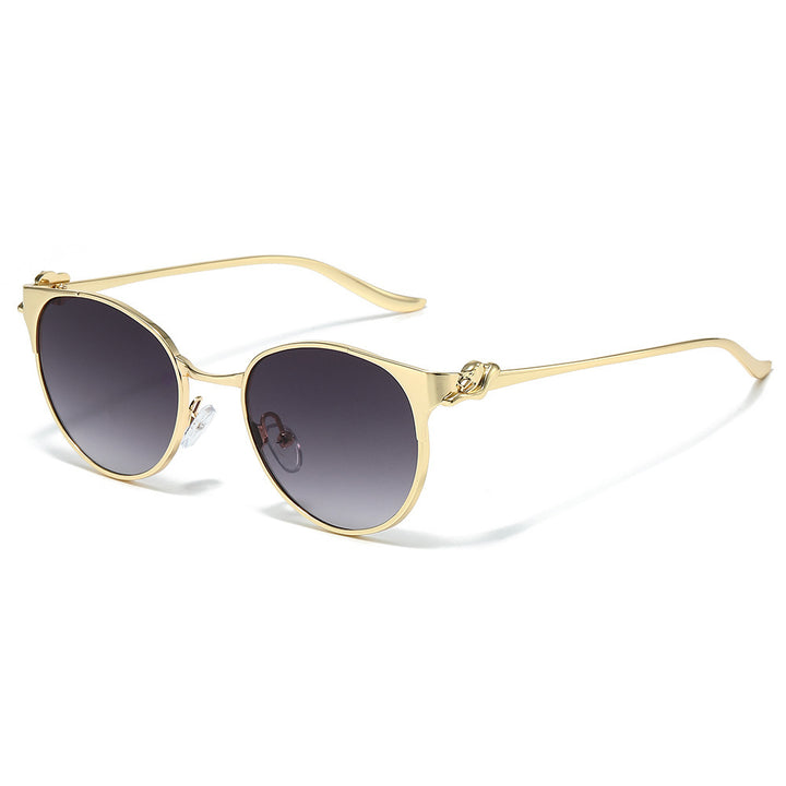 Elegante Cat-Eye-Sonnenbrille mit dekorativen goldenen Akzenten Karnz