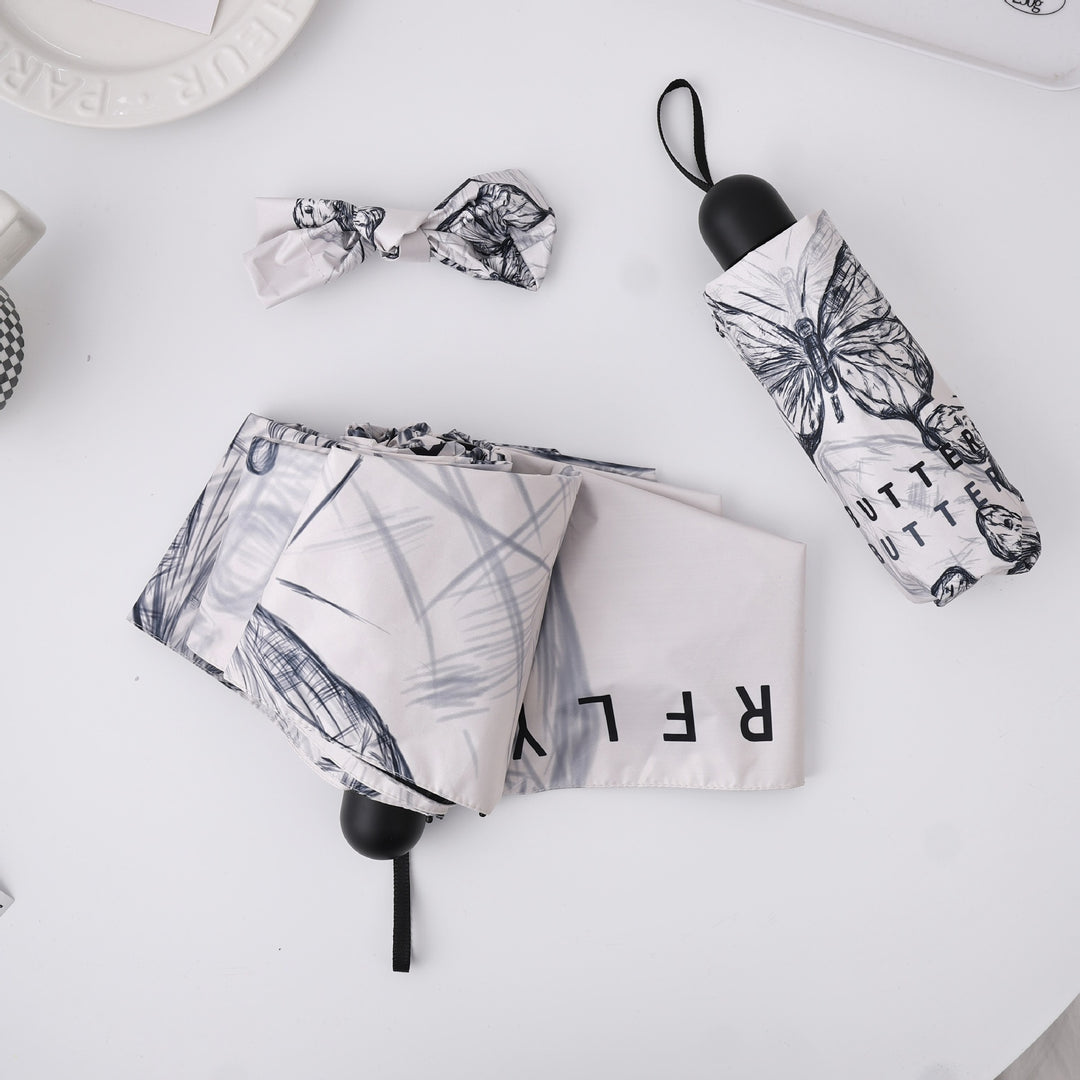 Damen modischer Faltregenschirm mit verspieltem Design Karnz