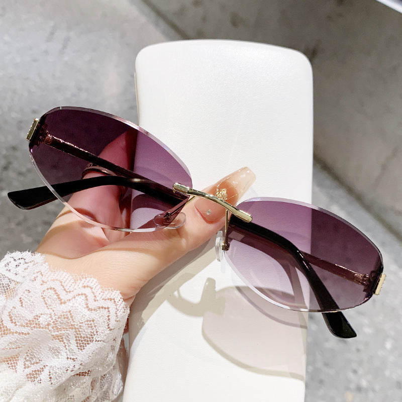 Damen Sonnenbrille im modernen Ovaldesign mit kontrastierendem Rahmen Karnz