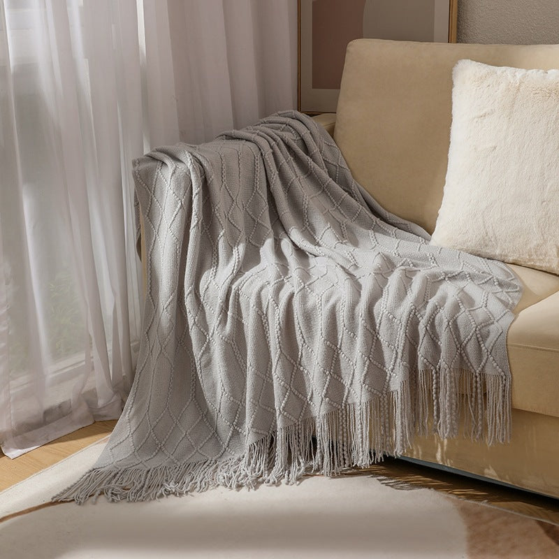 Gemütliche Strickwurfdecke