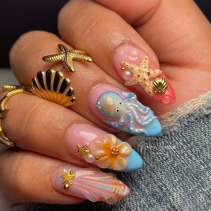 Dekoratives Press-On Nagelkunst-Set mit von Sommer inspirierten Ozeandesigns Karnz