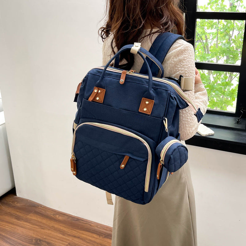 Multi-Taschen Stepp Rucksack Karnz