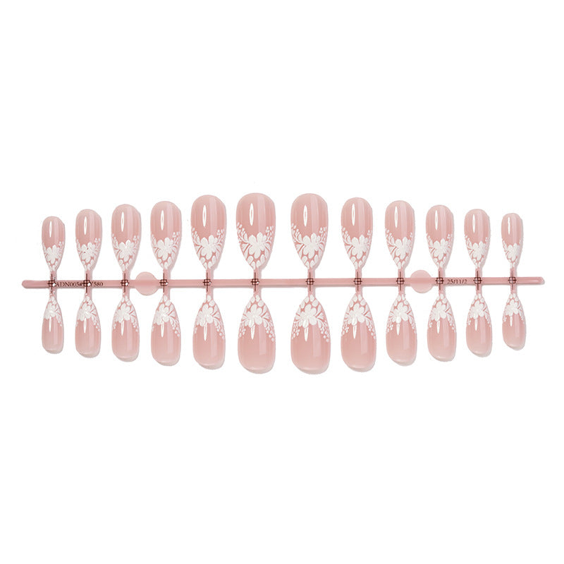 Elegantes dekoratives Press-On-Nagelset mit floralen Akzenten Karnz 1788495970