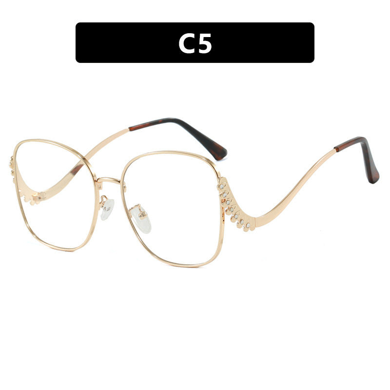 Damen auffällige Sonnenbrille mit funkelnden Applikationen Karnz